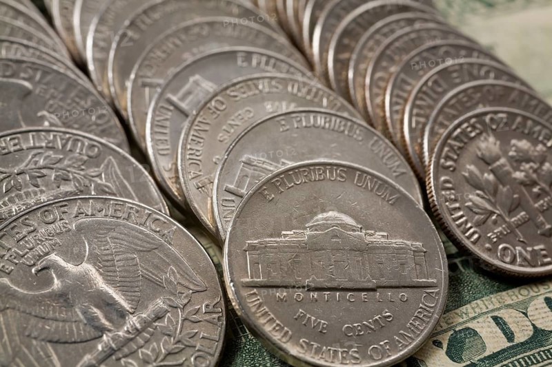 Close-up of rows of US quarter dollars, five cents and ten cents coins, Studio Composition, Quebec, Canada