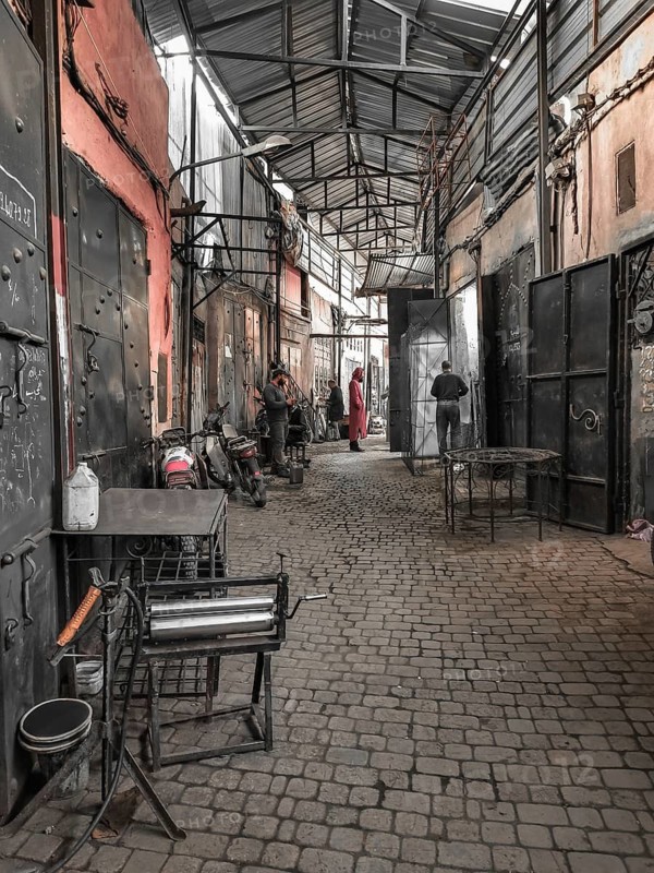 Shops in a narrow, covered alley in the Medina, atmospheric atmosphere, Morocco