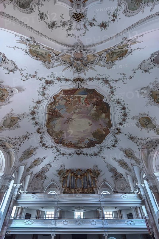 Organ loft and ceiling paintings in the baroque church of St. Andrew, Nesselwang, Bavaria, Germany