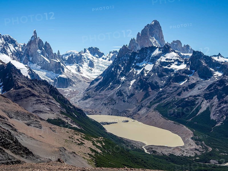 View from viewpoint Loma del Pliegue Tumbado, mountain range of Cerro Torre and Cerro Fitz Roy in the back, El Chalten, Argentina