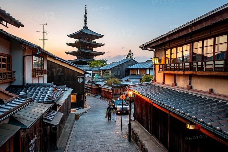 Yasaka dori historic street in the old town with traditional Japanese houses, five-story Yasaka Pagoda of the Buddhist Hokanji Temple at the back, evening mood, blue hour, Higashiyama, Kyoto, Japan