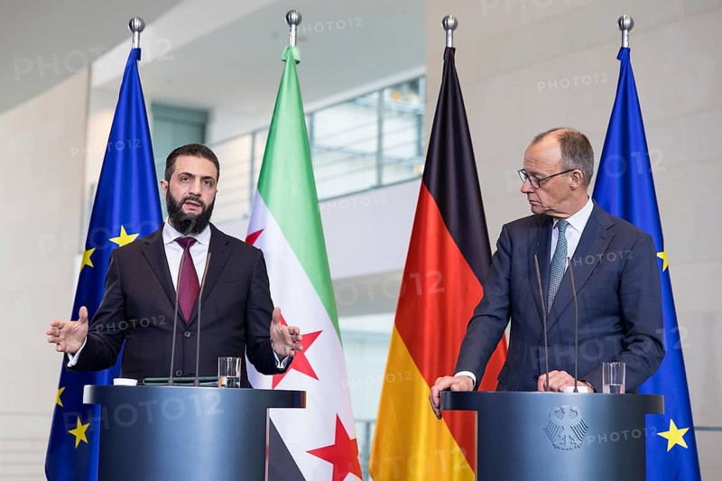 Ahmed al-Sharaa (President of the Syrian Arab Republic) and Friedrich Merz (Chancellor of the Federal Republic of Germany, CDU) at a press conference after a one-on-one meeting at the Federal Chancellery, Berlin, 30 March 2026