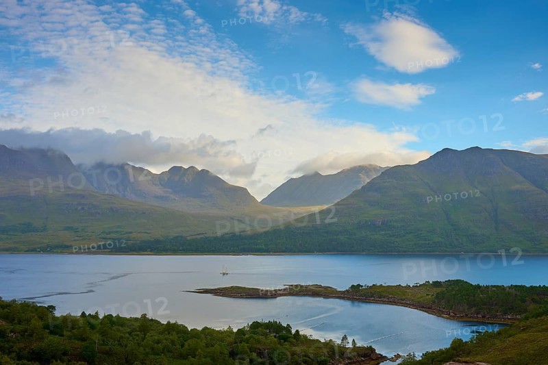 Mountain panorama with a lake under a partly cloudy blue sky, Loch Torridon, Kenmore, Strathcarron, Scotland, United Kingdom, Great Britain