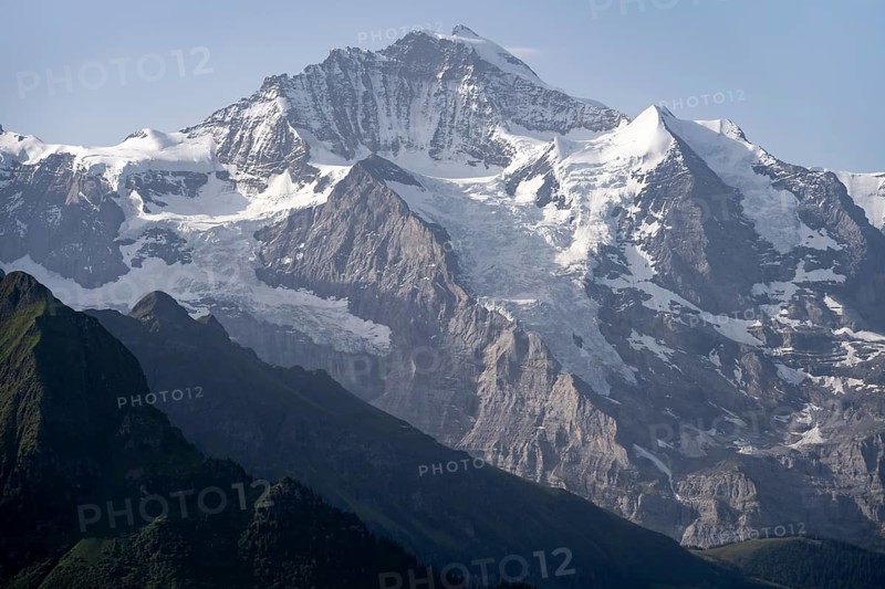 Glaciated Jungfrau mountain peak, picturesque mountain landscape, Bernese Alps, Bernese Oberland, Switzerland