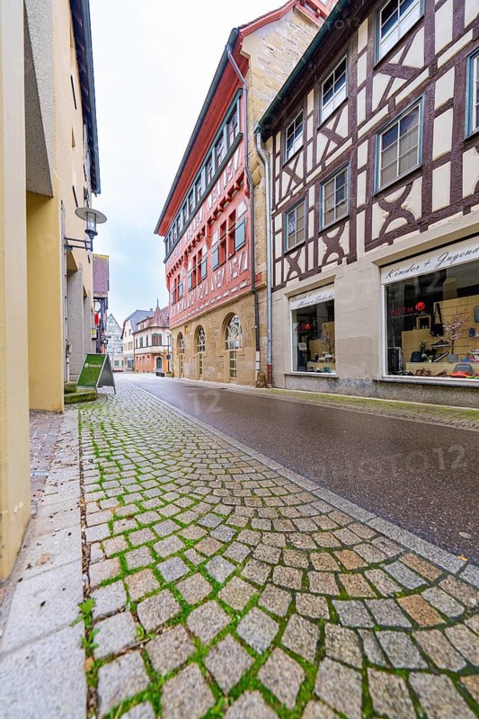 Cobblestone alley lined with half-timbered houses in the old town, Großbottwar, Ludwigsburg district, Baden-Württemberg, Germany