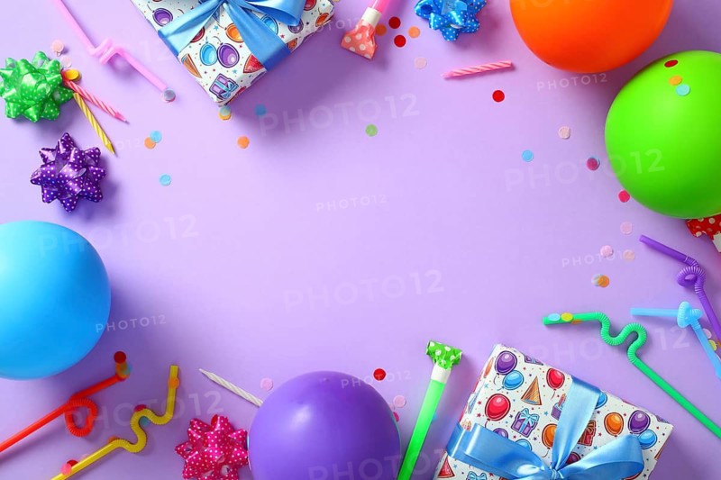 Colorful birthday party flat lay frame on purple background with copy space