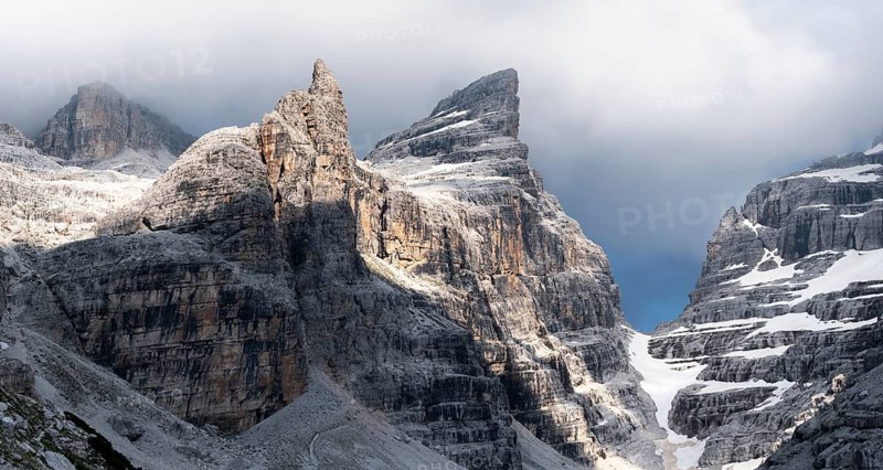 Mountain valley, Castelletto Superiore and Cima Sella peaks, back Scharte Bocca di Tuckett, dramatic atmosphere in the Brenta Mountains, Brenta, Brenta-Adamello Natural Park, Trentino, Italy