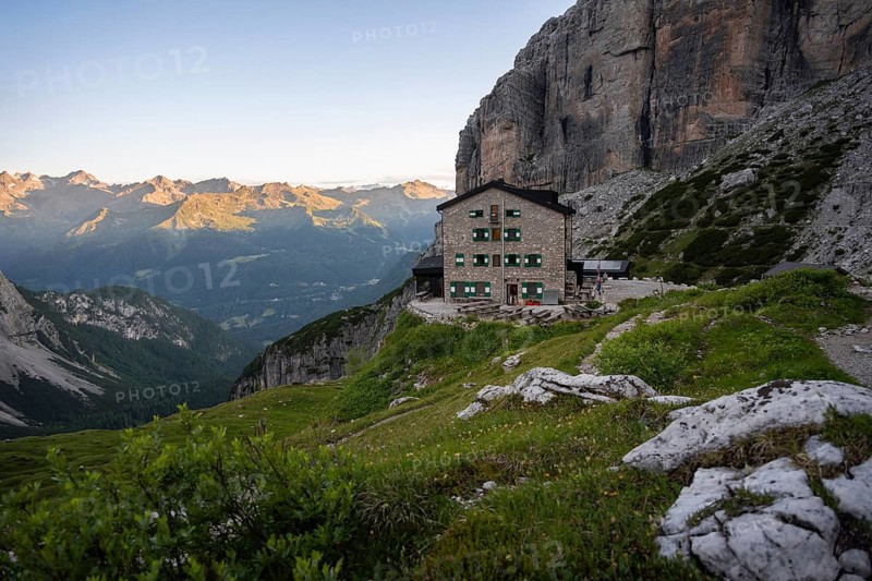 Rifugio Maria E Alberto Ai Brentai mountain hut and rocky peak, Brenta, Trentino, Italy