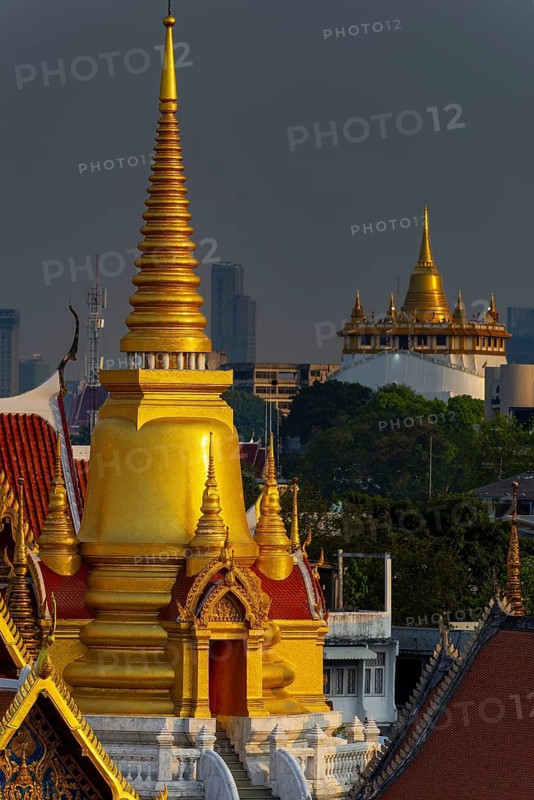 The chedi from Wat Tri Thotsathep Worawihan, behind it the Golden Mount, Bangkok, Thailand