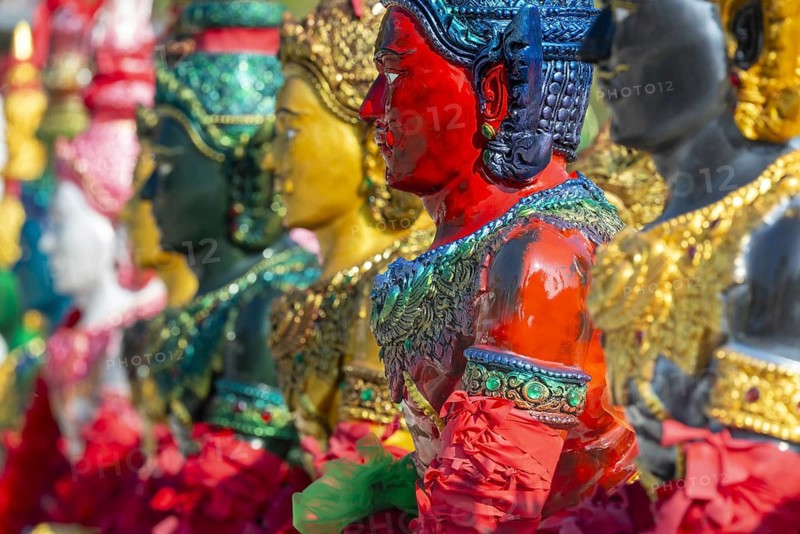 Thai style angel, graceful figures, in traditional golden clothing with ornate headdress, Thai Buddhism, Hinduism, Wat Pa Khasamakhi, Khao Kho Mountains, Phetchabun province, Isan, Thailand