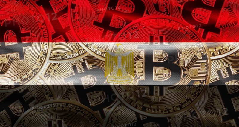 Golden bitcoins on Egypt flag background. Bitcoin coins on Egypt flag background