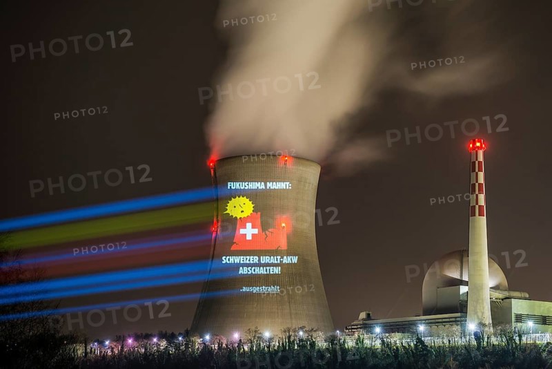 Protest action broadcast by the anti-nuclear organization, projection, night view, 05-03-2026, Waldshut, Leibstadt nuclear power plant, Rhine, Upper Rhine, Canton of Aargau, Switzerland