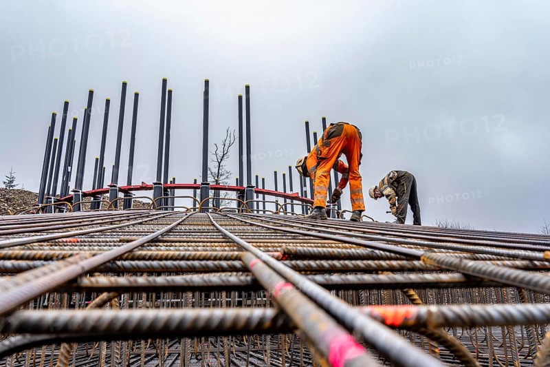 Assembly of reinforcing steel for the reinforced concrete foundation of a wind turbine, a mesh of rebar and rebar mesh, over 100 tons of reinforcing steel were used, the wind turbine will have a hub height of 160 meters, part of a new wind farm in Sauerland, near Balve, North Rhine-Westphalia, Germany