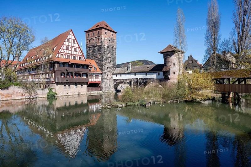 View of the Pegnitz river with the Weinstadel half-timbered building, the water tower and Henkersteg with the executioner's tower, on the far right the covered Maxbrücke in the old town of Nuremberg, Middle Franconia, Franconia, Bavaria, Germany