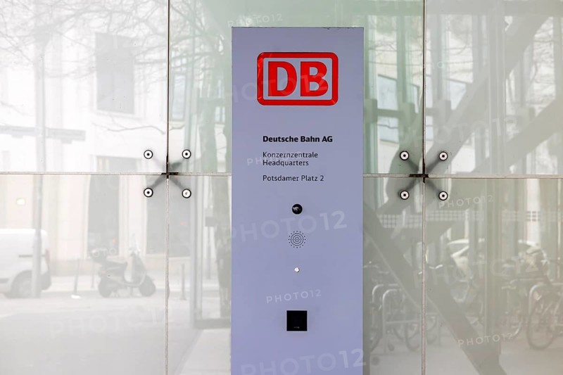 City view of Berlin. Deutsche Bahn AG logo in the entrance area of the headquarters. Railway tower at Potsdamer Platz. Berlin, Germany