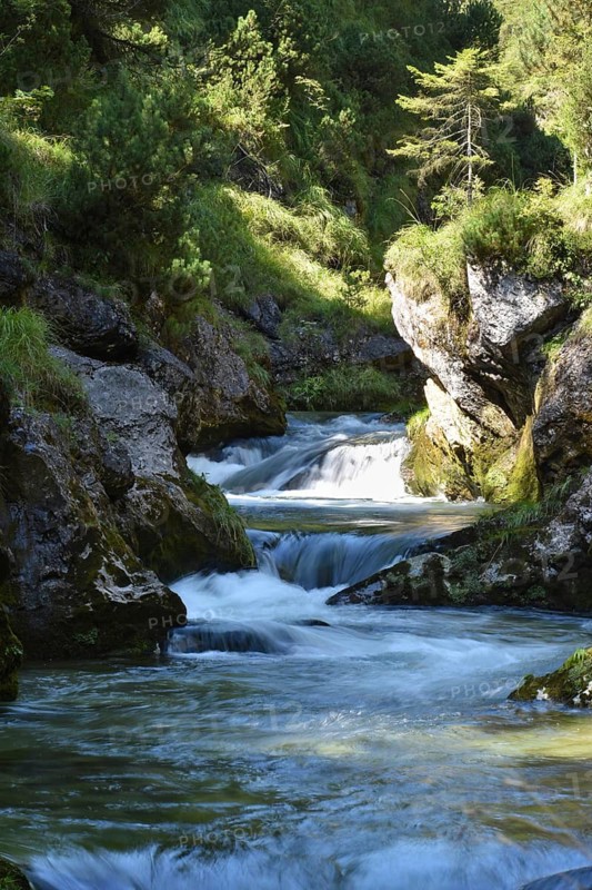 Mountain stream with clear, clean water in the Weißbach Gorge in the Chiemgau Alps, Bavaria, Germany