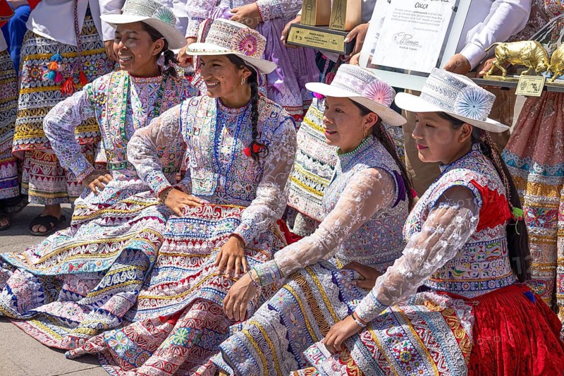 Arequipa, Peru, 2 February, 2026: Native indigenous people of Peru in National costumes perform dances and take images with people in Plaza de Armas in Arequipa, Peru