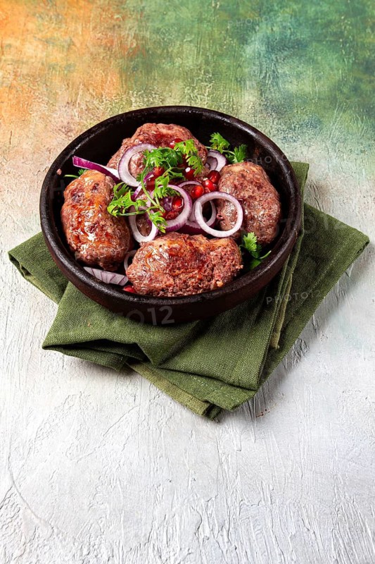 Fried apkhazura, cutlet in a fat grid, spicy, Georgian dish, fried on ketsi, homemade, no people