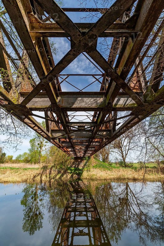 Lost place, disused rusty railway bridge spewing into the Finow Canal, Liebenwalde, Oberhavel, Brandenburg, Germany