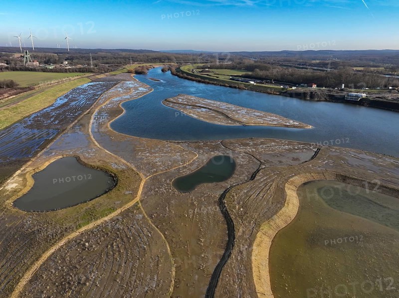 Haltern-Marl, North Rhine-Westphalia, Germany - Lippe, flood protection in the Haltern-Lippramsdorf-Marl area (HaLiMa) . Flood protection on the River Lippe by relocating the dyke and thus extending the floodplain. On the left, the completed floodplain north, the north dyke. Work is still in progress on the south dyke. At the back left, the headframe of the former shaft 8 of Auguste Victoria colliery