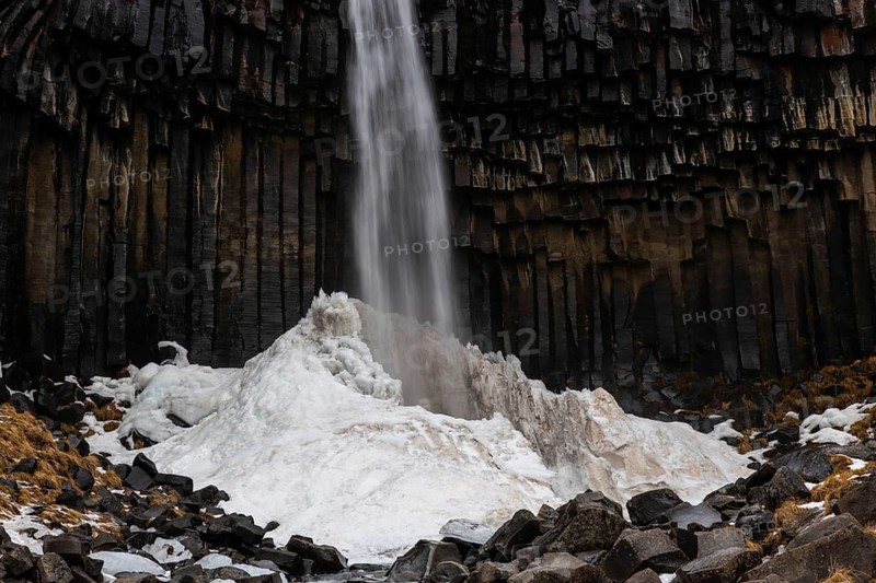 Waterfall, basalt columns, snow, winter, Svartifoss, Iceland, Scandinavia