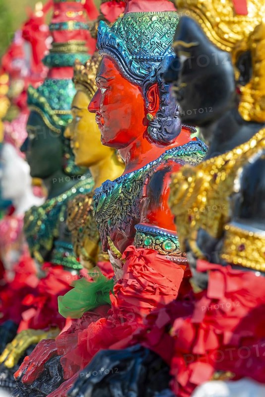 Thai style angel, graceful figures, in traditional golden clothing with ornate headdress, Thai Buddhism, Hinduism, Wat Pa Khasamakhi, Khao Kho Mountains, Phetchabun province, Isan, Thailand