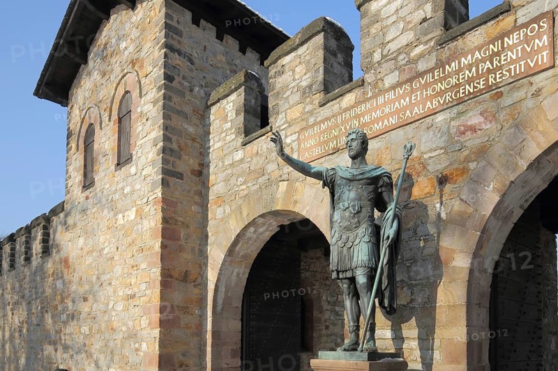 Portal and Roman statue with sceptre to the Roman UNESCO Castle Saalburg, Upper Germanic Rhaetian Limes, Latin inscription, Bad Homburg, Taunus, Hesse, Germany