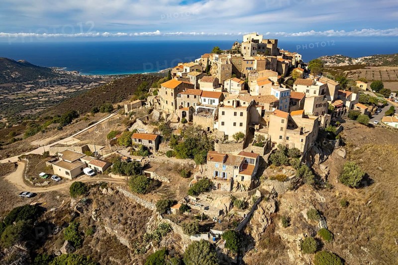 The village of Sant'Antonino in Balagne seen from the air, Corsica, France