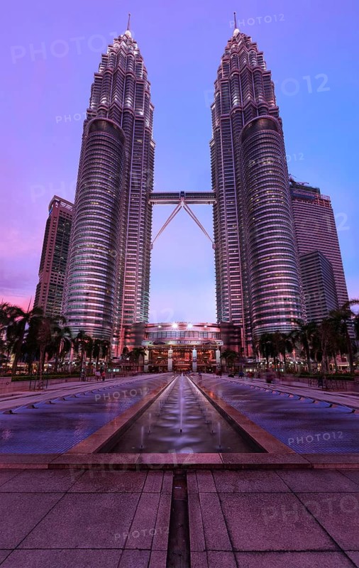 KUALA LUMPUR, MALAYSIA, MAY 5: Petronas Twin Towers in twilight on May 5, 2011 in Kuala Lumpur. They were the tallest building in the world 1998-2004 and remain the tallest twin building