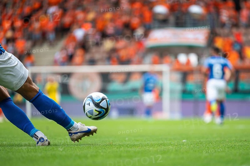 LUBIN, POLAND - JULY 23, 2023: Football match Polish PKO Ekstraklasa between KGHM Zaglebie Lubin vs Ruch Chorzow 2:1. Detail of pleyer's legs kicks the ball.