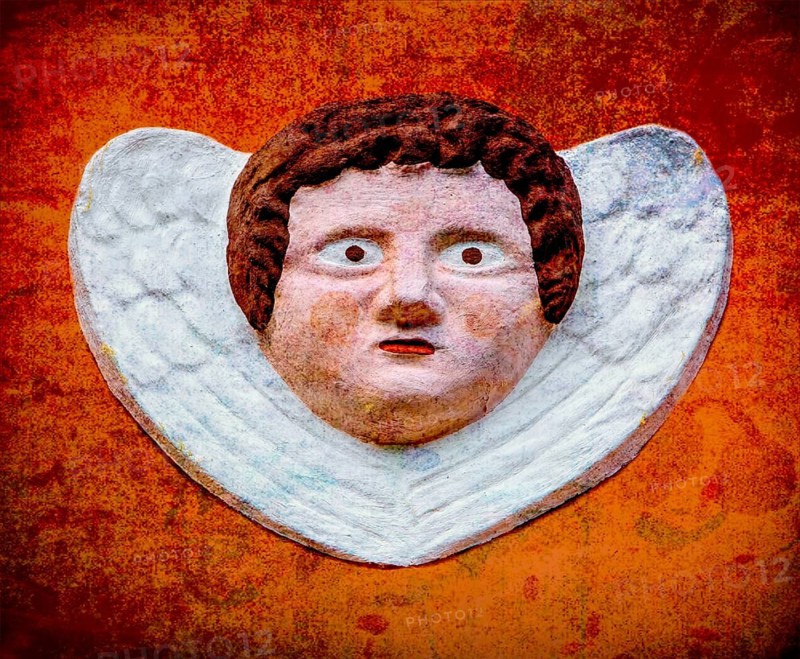 Old angel figure, late Renaissance stone carving, Rinnesches Haus, Kornmarkt, Osterode am Harz, Germany