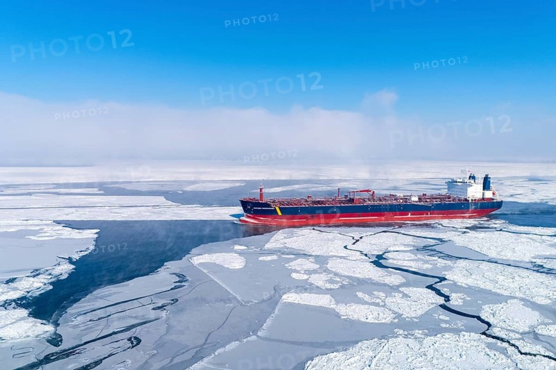 LNG carrier going up the frozen St. Lawrence River, Region of Center Quebec, Province of Quebec, Canada