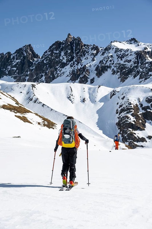 Ski tourers on the Graubünden Haute Route, Snow-covered mountains, Winter in the Albula Alps, Graubünden, Switzerland