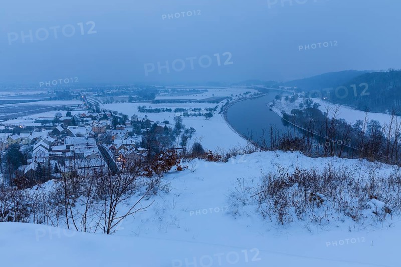 Twilight view in snow, view of Sörnewitz and the Elbe from the Bosel peak on a winter morning, Coswig, Saxony, Germany