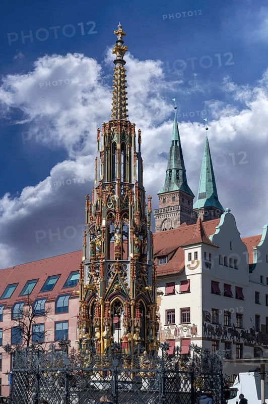 Beautiful fountain, behind the Chamber of Crafts and the towers of St Sebaldus Church, Nuremberg, Middle Franconia, Bavaria, Germany