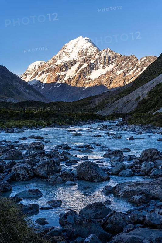 Mountainous landscape. Hooker River and Aoraki Mount Cook. evening light. Aoraki Mount Cook National Park, Canterbury, South Island, New Zealand