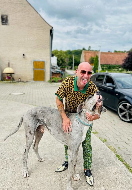 Young man with a Great Dane, Bavaria, Germany