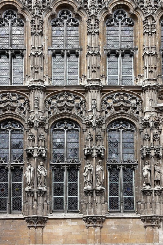 Historic town hall Stadhuis, partial view of the façade in Flamboyant Gothic style with sculptures, Botermarkt, Ghent, Flanders, Belgium