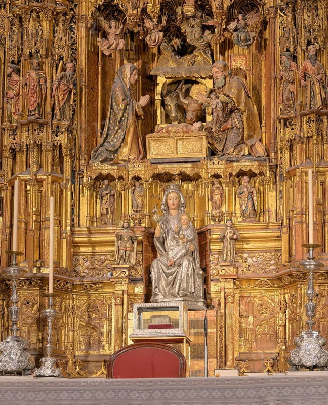 Gilded altar with Madonna figure and ornate details, Seville, Andalusia, Spain