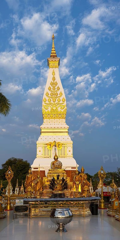 Chedi decorated with golden ornaments at Wat Phra That Phanom at sunrise, temple complex in Amphoe That Phanom, Nakhon Phanom Province, Isan, Thailand