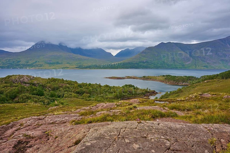 Rocky landscape with mountains and a lake under cloud cover, Loch Torridon, Kenmore, Strathcarron, Scotland, United Kingdom, Great Britain
