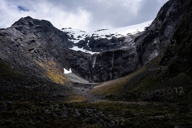 Mountainous landscape, snow-capped Mount Talbot seen from Milford Road. Fiordland National Park, Southland Region, South Island, New Zealand