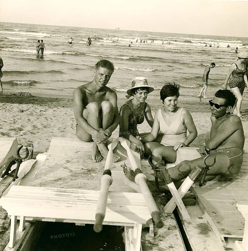 Historical photo summer 1961, tourists, beach, Rimini, Italy