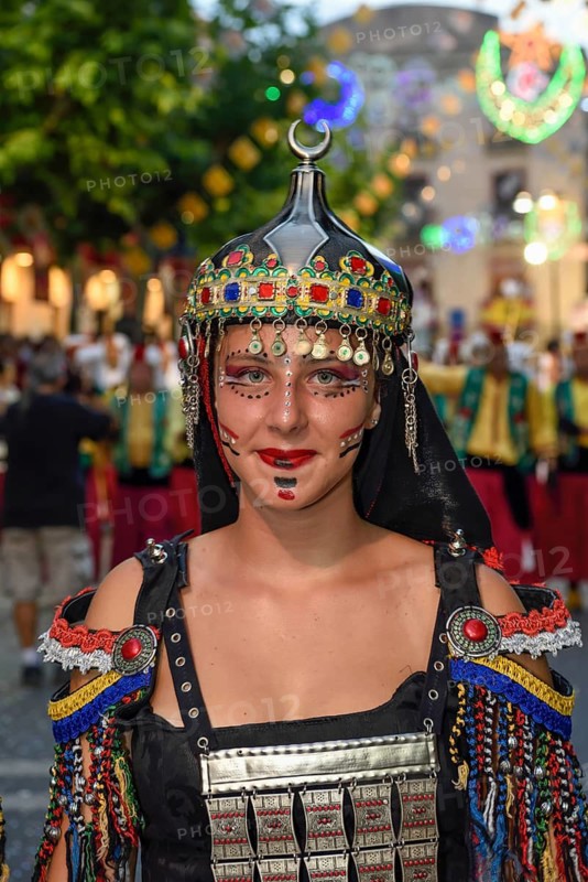Woman in traditional clothes, Moors and Christians Parade, Moros y Cristianos, Jijona or Xixona, Province of Alicante, Costa Blanca, Spain