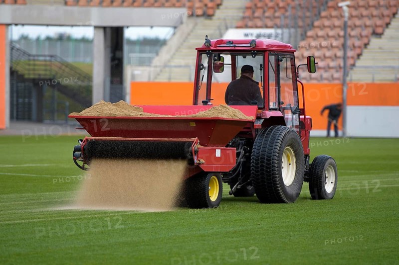 Sandblasting of football field