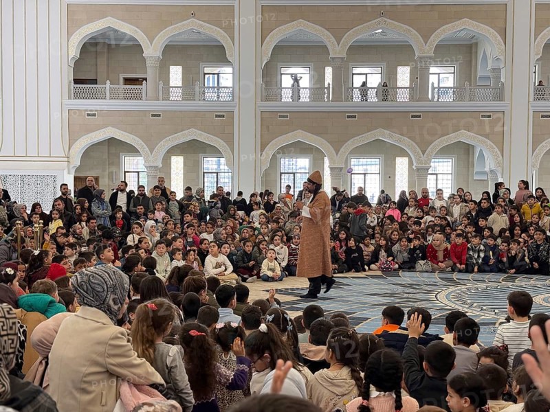 Dozens of Muslim children participate in indoor entertainment event inside a grand mosque during the Eid al-Fitr celebrations celebrated by Muslims in the Middle East and around the world in Gaziantep, Turkey on March 28, 2026, Gaziantep, Turkey