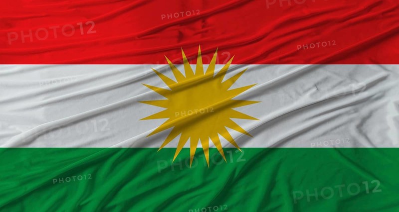 Kurdistan flag waving. Flag of Kurdistan with cloth texture
