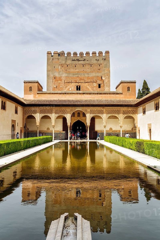 Myrtle courtyard with water basin and Torre de Comares, arabesque Moorish architecture, Nasrid palaces, Alhambra, Granada, Andalusia, Spain
