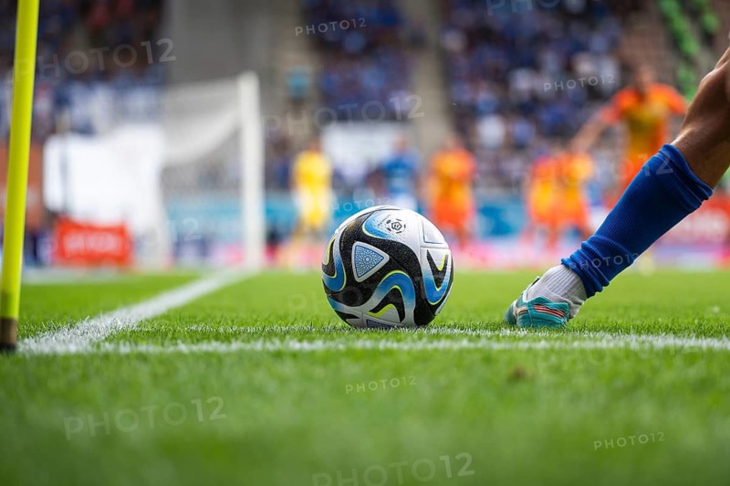 LUBIN, POLAND - JULY 23, 2023: Football match Polish PKO Ekstraklasa between KGHM Zaglebie Lubin vs Ruch Chorzow 2:1. Player's leg and the ball in the corner.