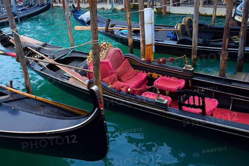 Gondola with red seat cushions, Venice, Veneto, Italy